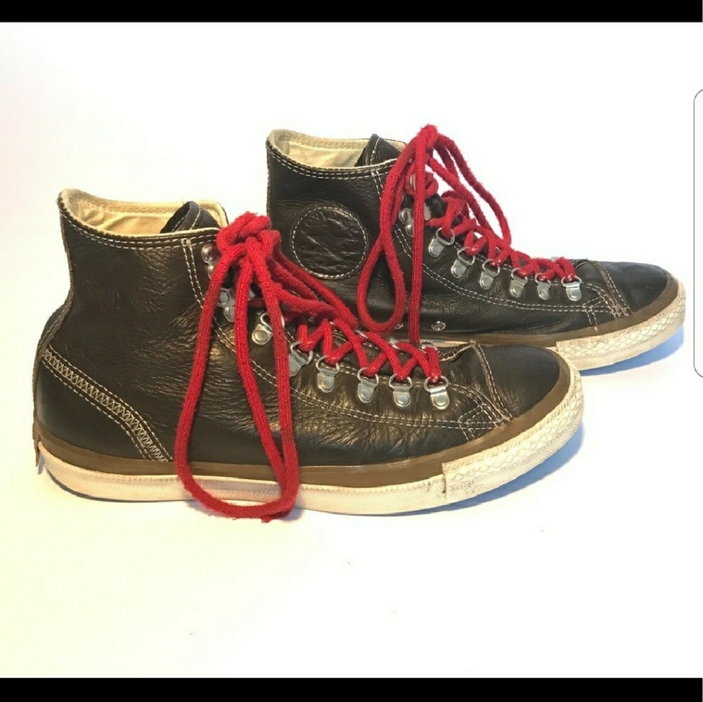 Brown leather converse